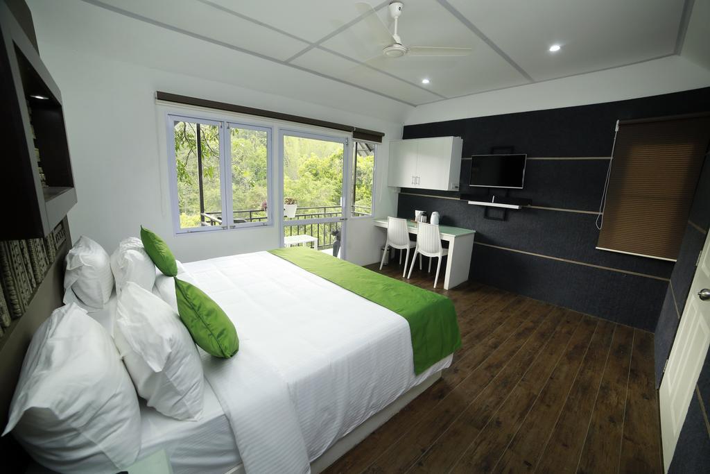 Moselberg Riverside Cottages Муннар Екстер'єр фото